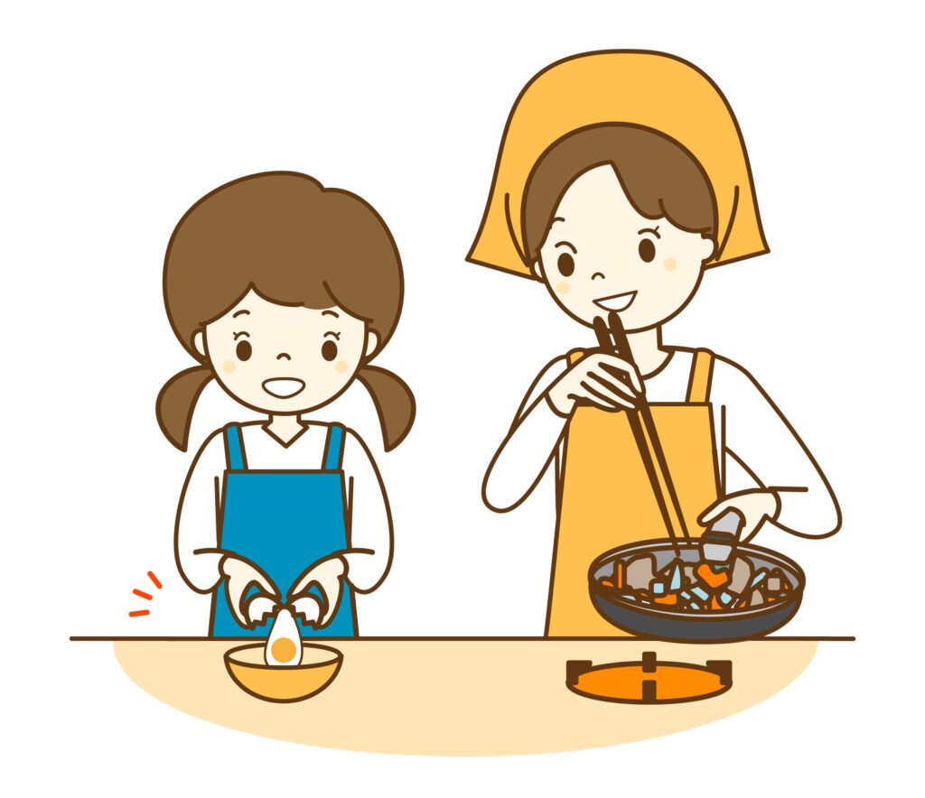 親子で料理をしている様子のイメージ画像